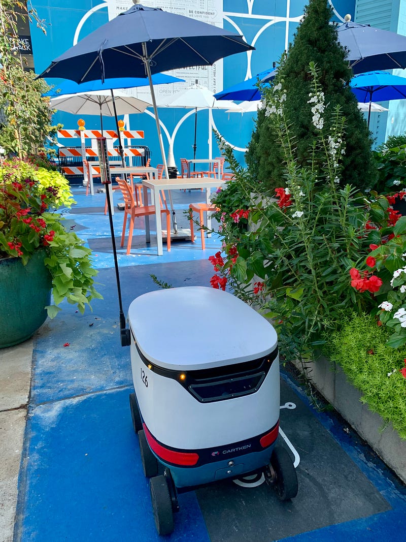 Autonomous robots delivering food in Mosaic District