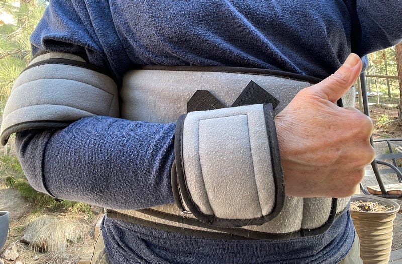 An immobilizing sling for a broken arm.