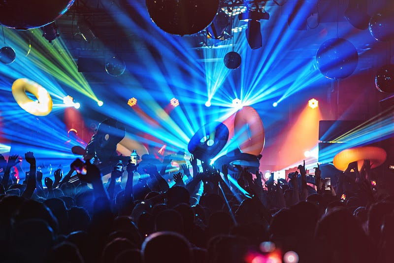 A vibrant nightclub scene with dancers enjoying the music