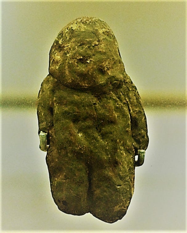 Ancient figurine representing early human artistry.