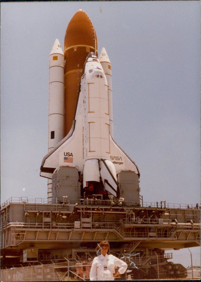 Family photo of my mother in front of The Challenger